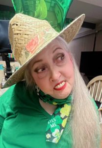 A woman dressed up in green for St. Patty's day
