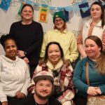 6 women and 1 man for total 7 community inclusion coaches